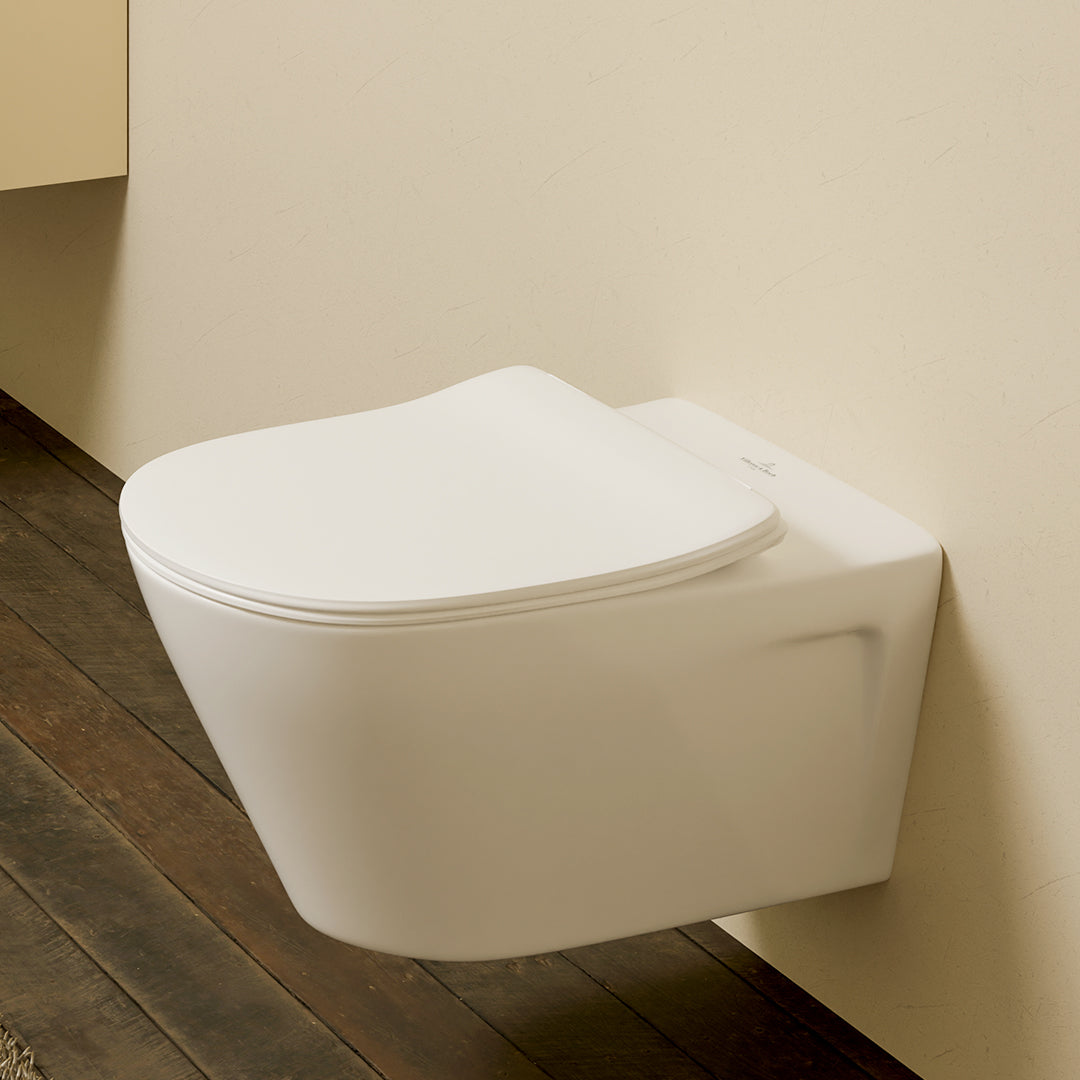 ( طلب مسبق )  مرحاض معلق فيلروي اند بوخ سبواي 5C35T301 ابيض لامع ريمليس بالسيديلي ذاتي الغلق والمقبض والشطاف الداخلي ومجموعة التثبيت